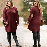 monogrammed sweater dress with black tights