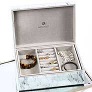 marble jewelry box with rings and bracelets