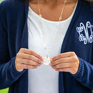 long monogrammed pave necklace with navy fringe cardigan