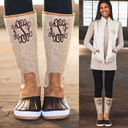 monogrammed tall duck boots with monogrammed puffy vest and dropped hem layering tunic