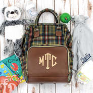 Monogrammed Plaid Diaper Backpack with baby toys