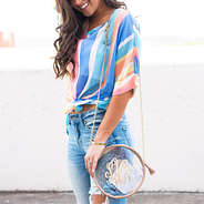 monogrammed clear circle purse with trendy outfit