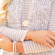 gold monogrammed scalloped pendant necklace with pearl bracelets