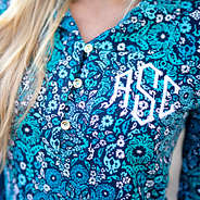 collared floral pullover in blue with gold buttons