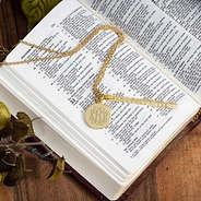 gold bible verse necklace on the bible in proverbs