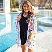 colorful kimono outfit with romper and tassels by the pool