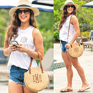 monogrammed straw crossbody on arm and shoulder