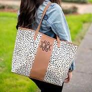 girl wearing monogrammed leopard tote on shoulder