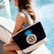 girl at the pool with monogrammed sparkly pineapple beach tote