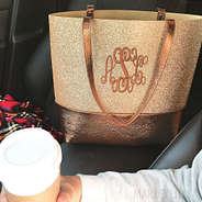 monogrammed gold glitter tote in car with coffee