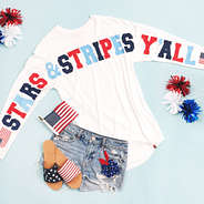 stars and stripes jersey with jean shorts and slide sandals
