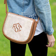 glitter gold crossbody bag close up with monogram