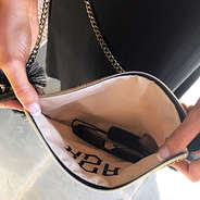 inside of straw fringe monogrammed crossbody bag