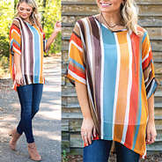 sheer striped dolman sleeved tunic with jeans and booties