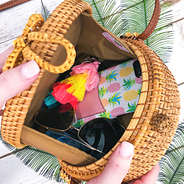 inside hard round straw bag with loop closure