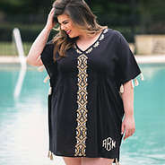 girl by the pool in black and gold monogrammed butterfly tassel kimono