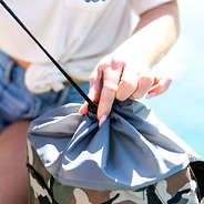 up close of monogrammed camo messenger lunch cooler drawstring closure