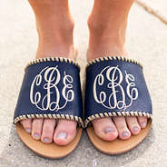 navy whipstitch sandal toppers on sandal outside