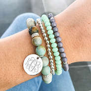 mint monogrammed stackable bracelet set on arm