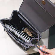 inside mini charcoal backpack with zipper and foldover snap flap