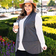 charcoal gray reversible vest with white tunic and hat