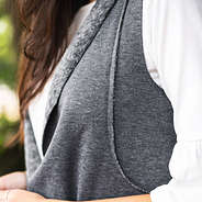 close up of seams on gray reversible vest