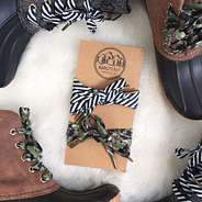 camo and black and white striped shoelaces with marleylilly branded card