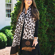 monogrammed rectangle leopard print scarf with long sleeved black dress