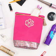 monogrammed ditty bag in hot pink confetti with makeup and toiletries