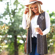 monogrammed knit vest with knotted monogrammed tunic shirt