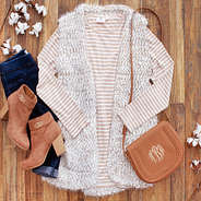 cozy knit vest with dropped hem layering tunic and interchangeable crossbody