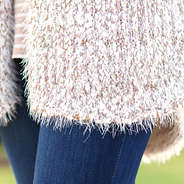 close up of cozy knit vest fabric