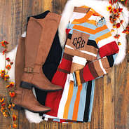 monogrammed colorblock peplum top with riding boots