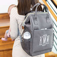 diaper backpack holding baby