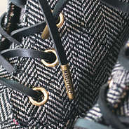 branding on end of black suede shoelaces
