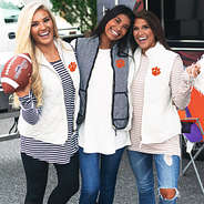 girls at clemson tailgate wearing cute clemson vests