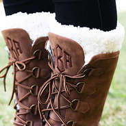 close up of ivory sherpa socks and duck boots