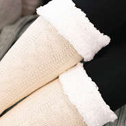 close up of knit oatmeal sherpa tall socks