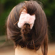 pink sherpa hair clip in bun