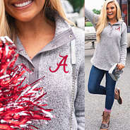 blonde wearing alabama heathered pullover tunic with jeans and duck boots