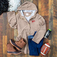 richmond khaki rain jacket with wood background