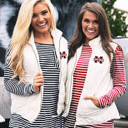 girls in mississippi state puffy vests with striped tees