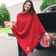 crimson poncho with alabama logo at tailgate