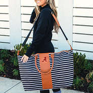 alabama weekender bag on shoulder