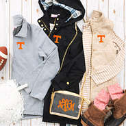 tennessee pullover sweatshirt,  heathered quilted vest, and black plaid rain jacket