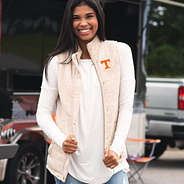 oatmeal tennessee heathered quilted vest at a tailgate