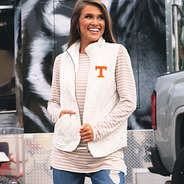 tennessee puffy vest with pockets and striped tee underneath