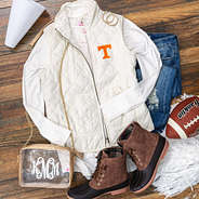 tennessee gameday outfit with puffy vest and duck boots