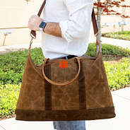 sp23 clemson canvas weekender on shoulder