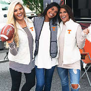 girls at tennessee tailgate on gameday wearing cute vests